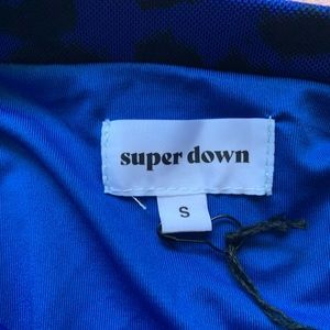 Mesh Top with mini skirt. Both sold together